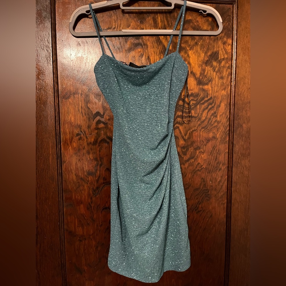 From Windsor. Size XS. Color is teal. Brand new. Never worn.